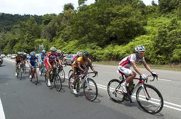 The breakaway group make their way up a climb.