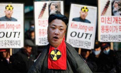 An effigy of North Korea's leader Kim Jong-un is on display during a protest a day after the country conducted its third nuclear test on Feb. 12.
