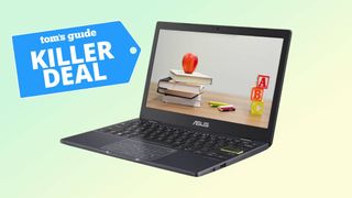 Asus E21OMA laptop with a Tom's Guide deal tag