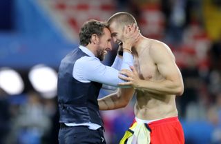 Gareth Southgate, left, and Eric Dier celebrate World Cup 2018 victory over Colombia