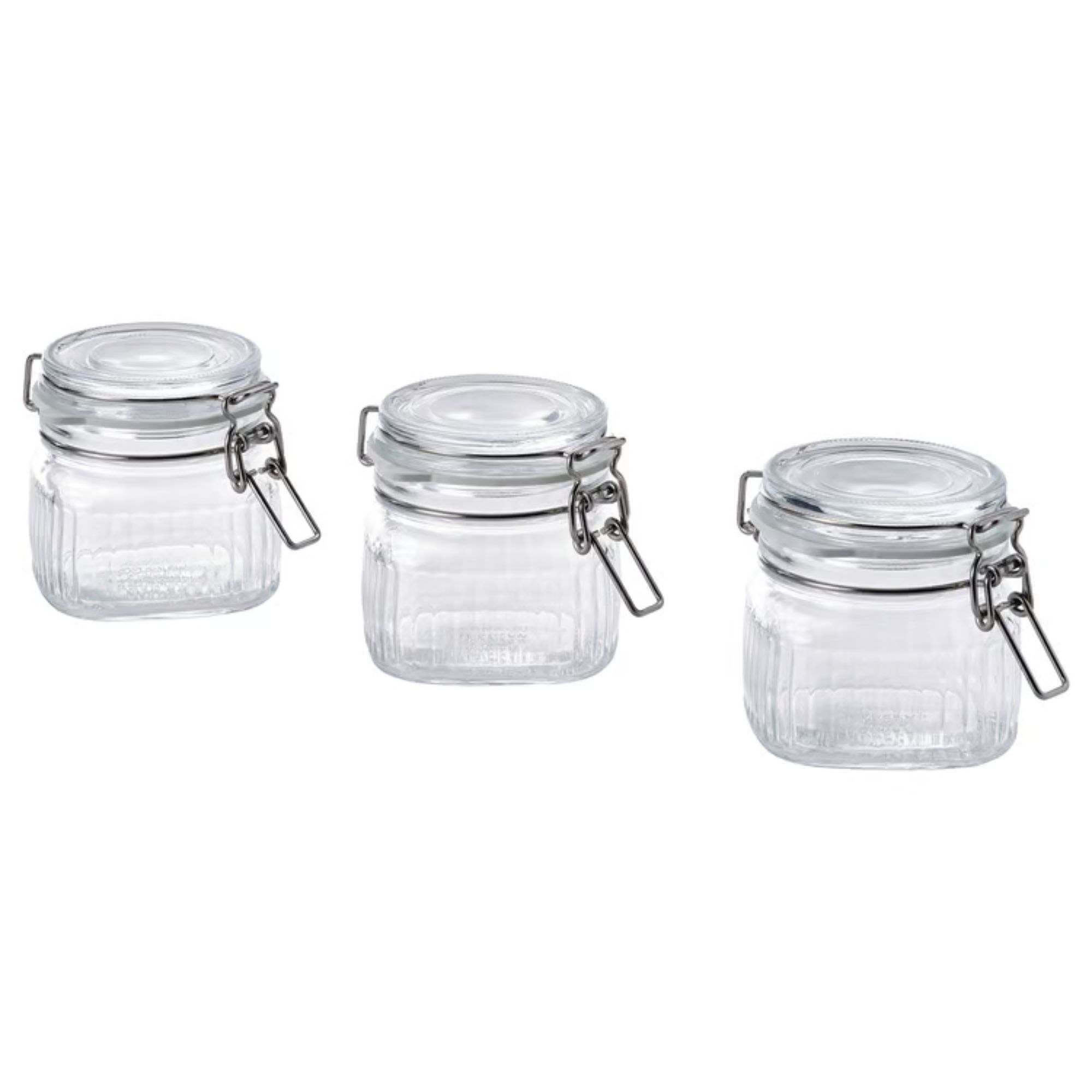 Three small fluted glass jars