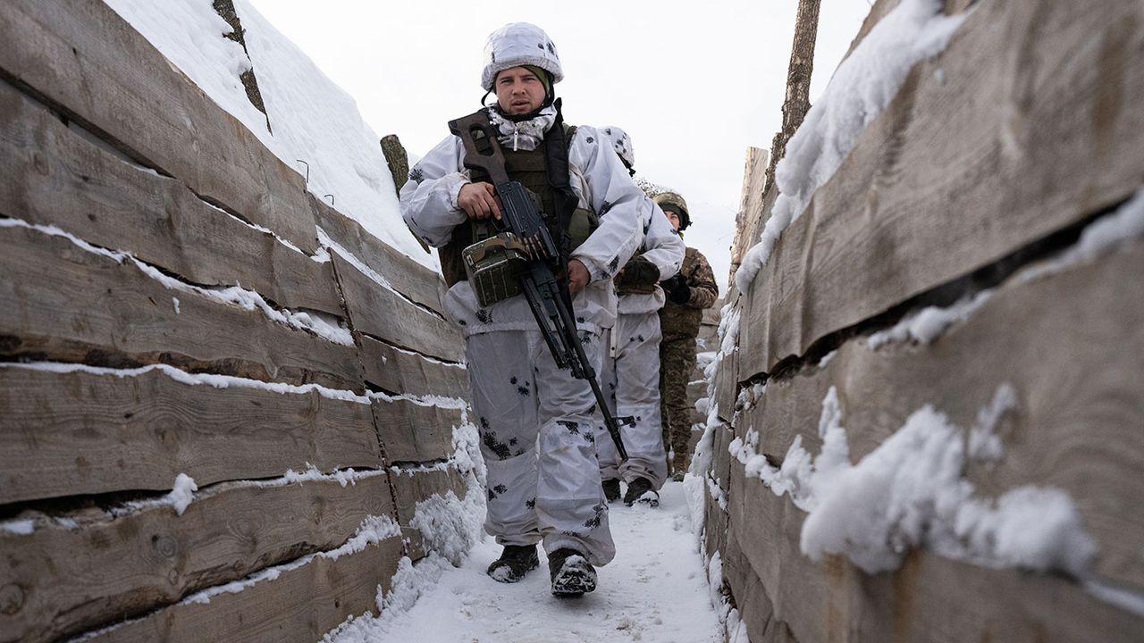 Ukrainian soldier in a trench