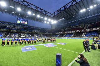 Inter and AC Milan players line up ahead of their Champions League semi-final second leg at San Siro in May 2023.