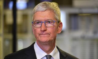 Tim Cook wearing a suit and neutral experience.