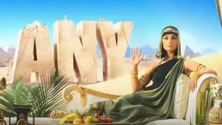 A woman dressed as Cleopatra holds up a 5 for 5 dollar footlongs.