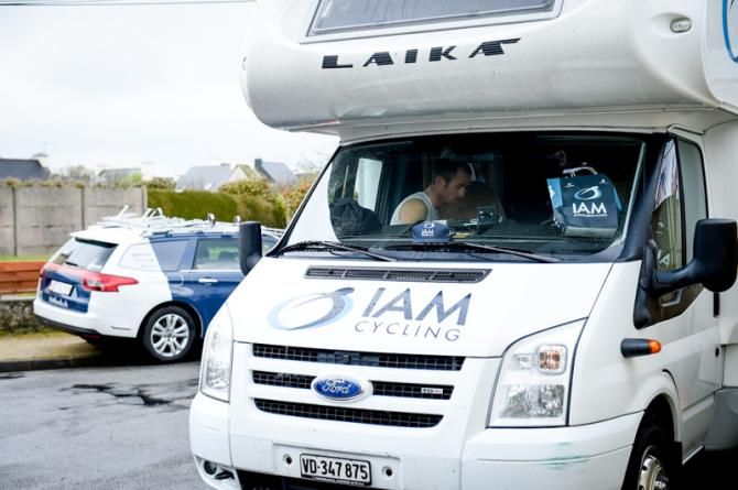 It was a cold day, riders prepared for the race in a camper