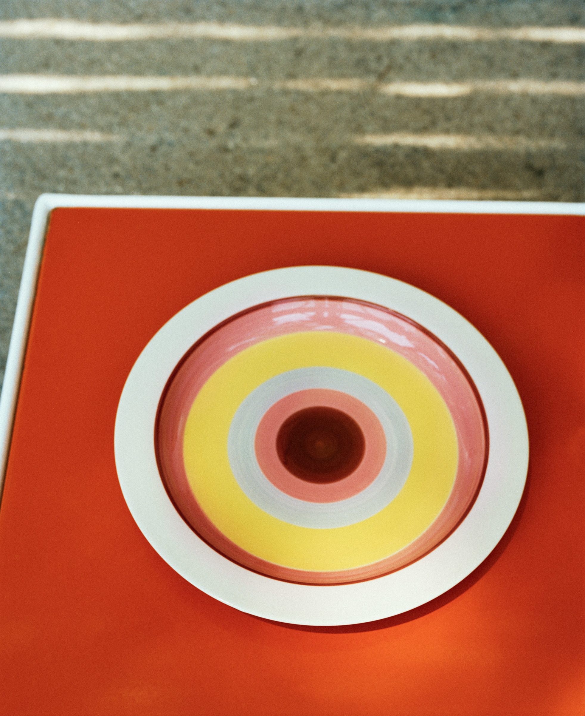 plate decorated with rings of colour