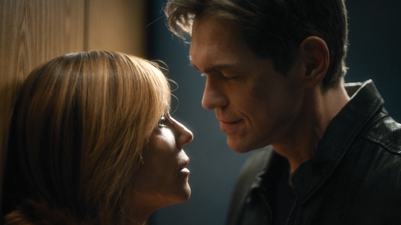 Morgan and Wagner standing face to face inside an elevator just after kissing in High Potential Season 2