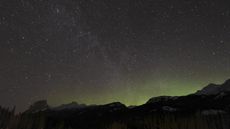 The sky is aglow during the Quadrantid meteor shower, as seen from Banff National Park in Alberta, Canada, on Jan. 3, 2009.
