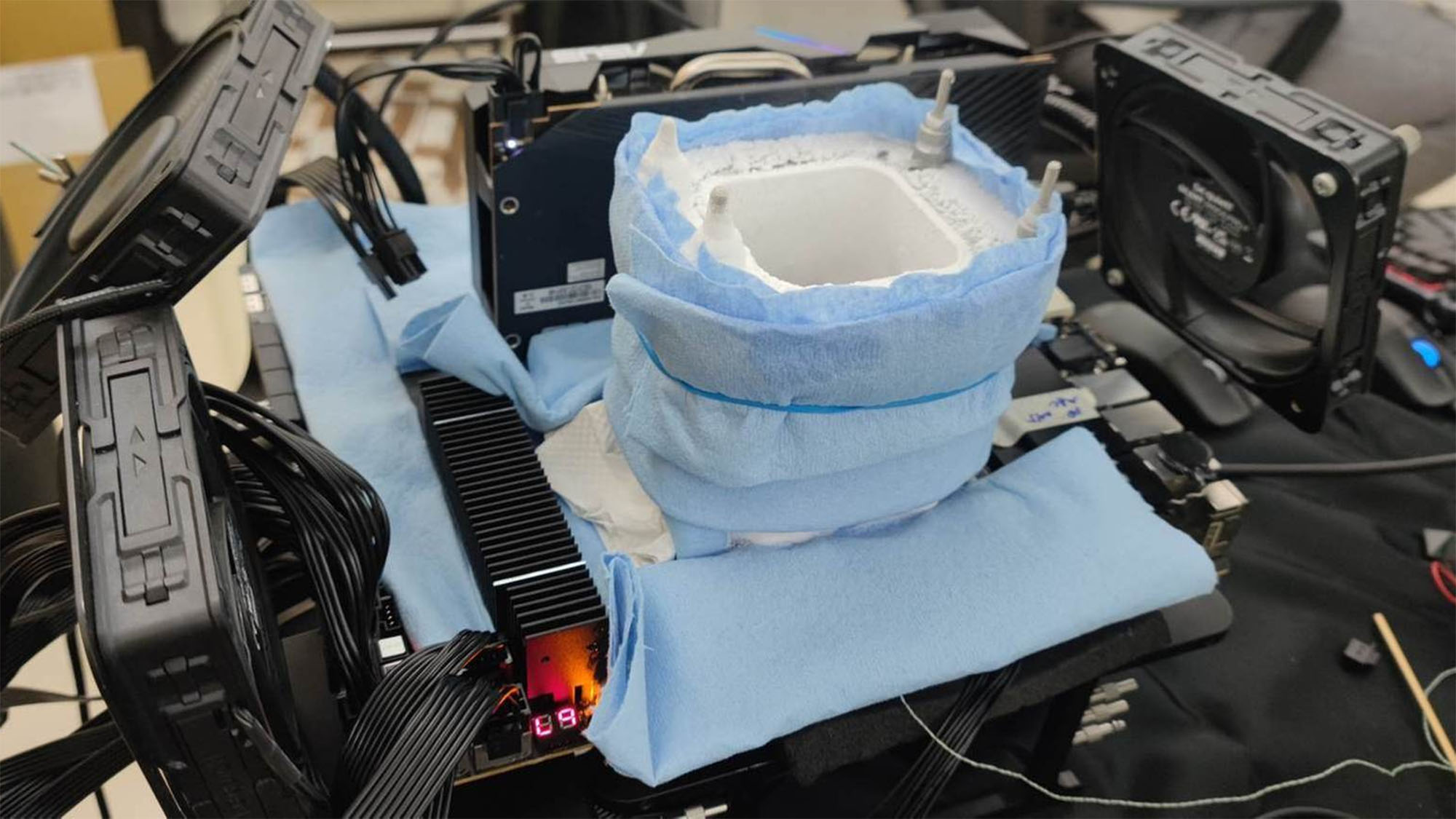 An Intel Xeon W9-3495X being cooled by liquid nitrogen