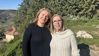 Irene Meca Mateo and her cousin Rocio stand on a hillside in Long Lost Family