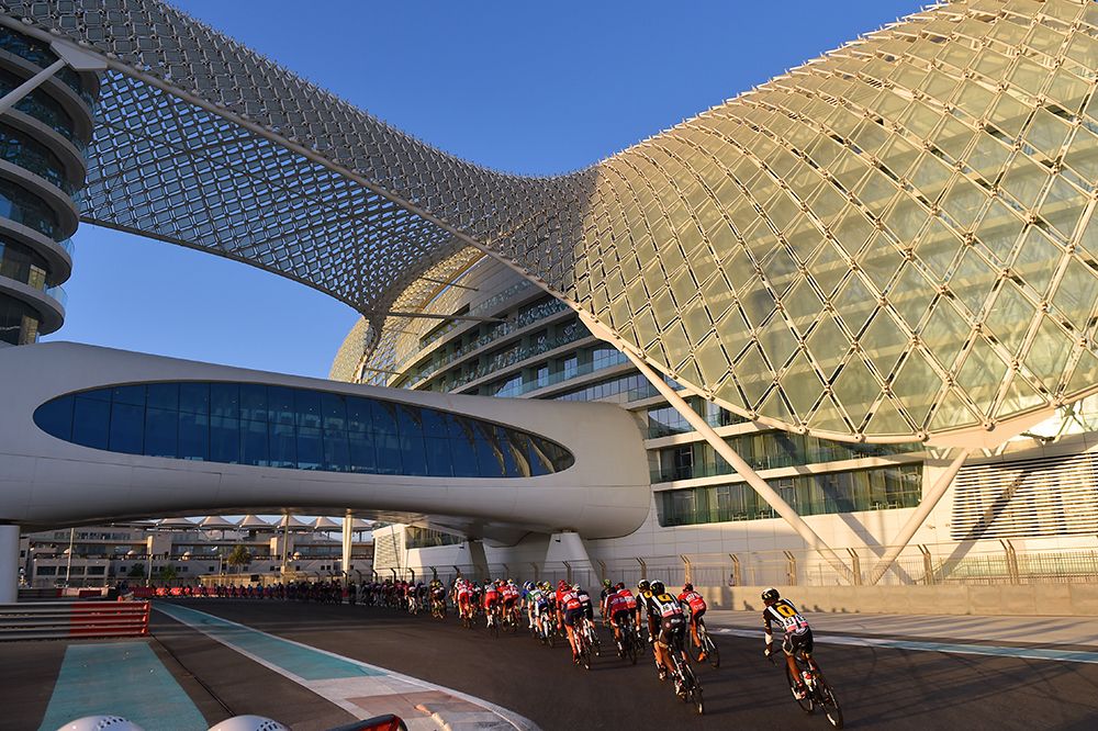 Racing on the Yas Marina Formula One circuit at the Abu Dhabi Tour