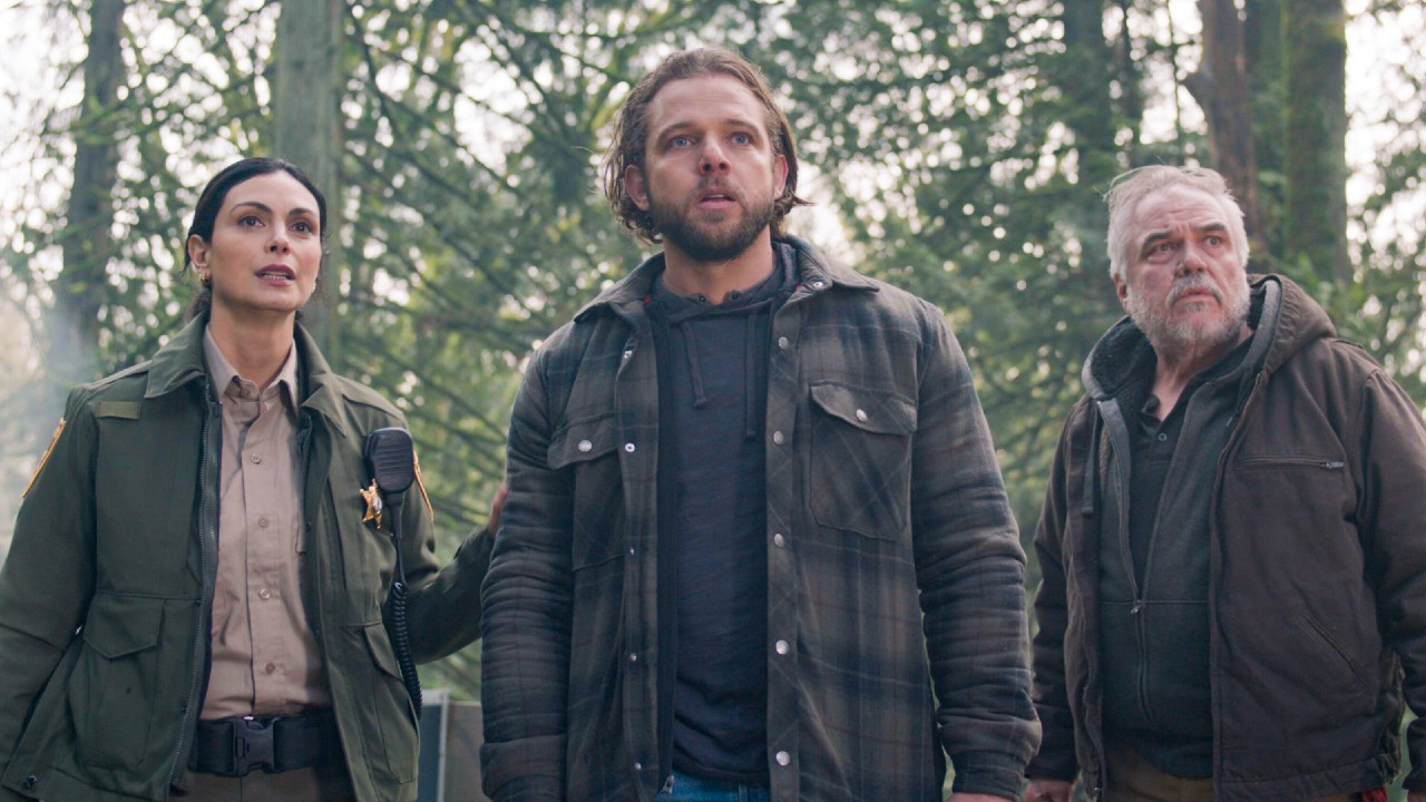 Morena Baccarin as Sheriff Mickey Fox, Max Thieriot as Bode Leone, and W. Earl Brown as Wes Fox in Fire Country.