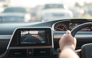 Rear area image showing automobile occurrence/Automotive rear area video camera