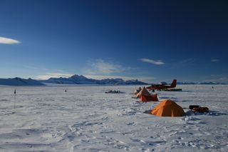 antarctic survey plane and camp.