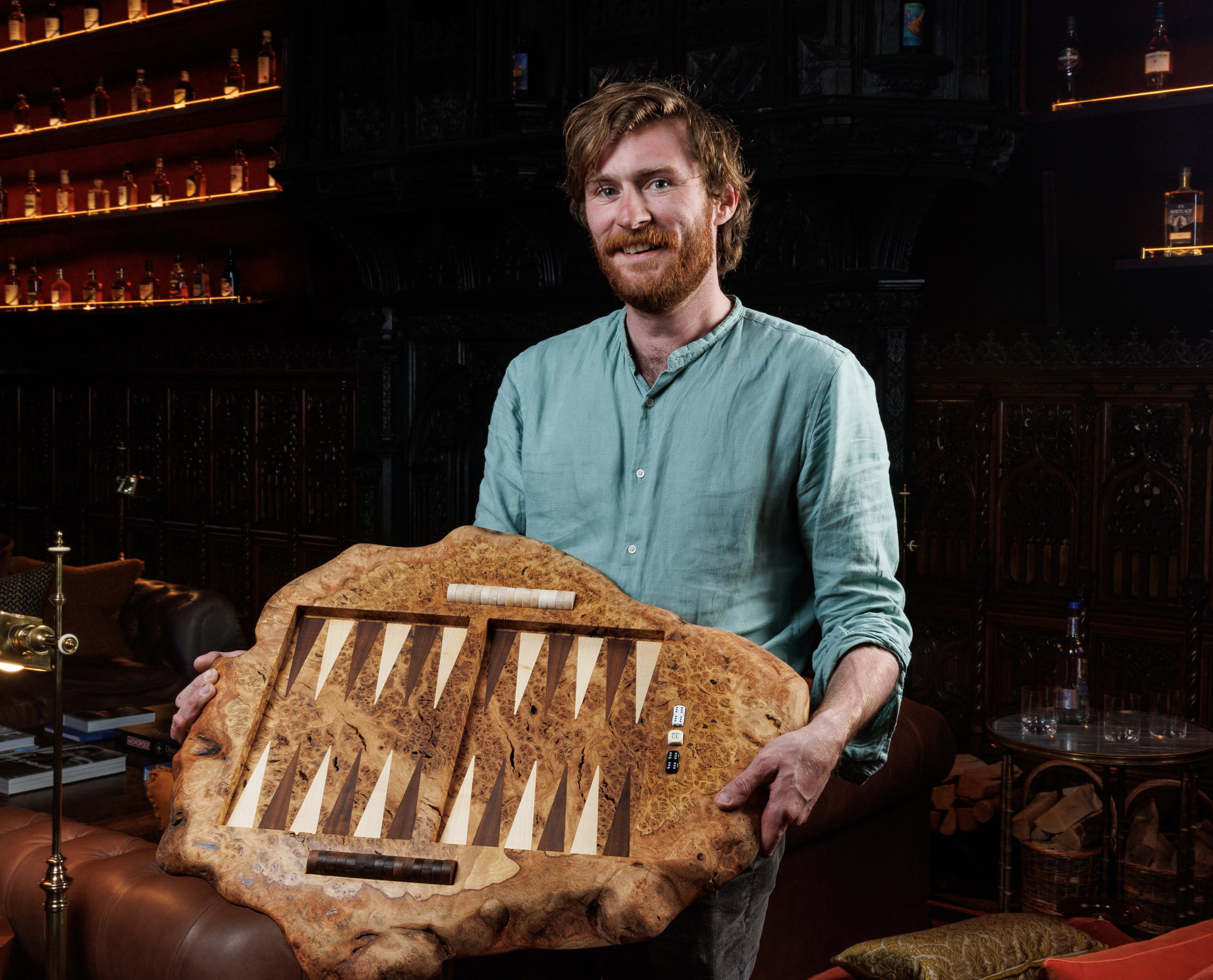 Eion Gibbs holds up an ornate backgammon set