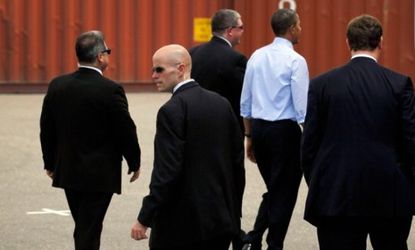 Secret Service agents surround President Obama in Tampa, Fla.