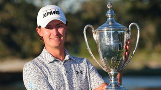 Maverick McNealy with the RSM Classic trophy