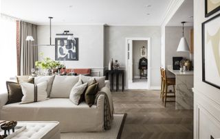 cream sofa in open plan kitchen living area