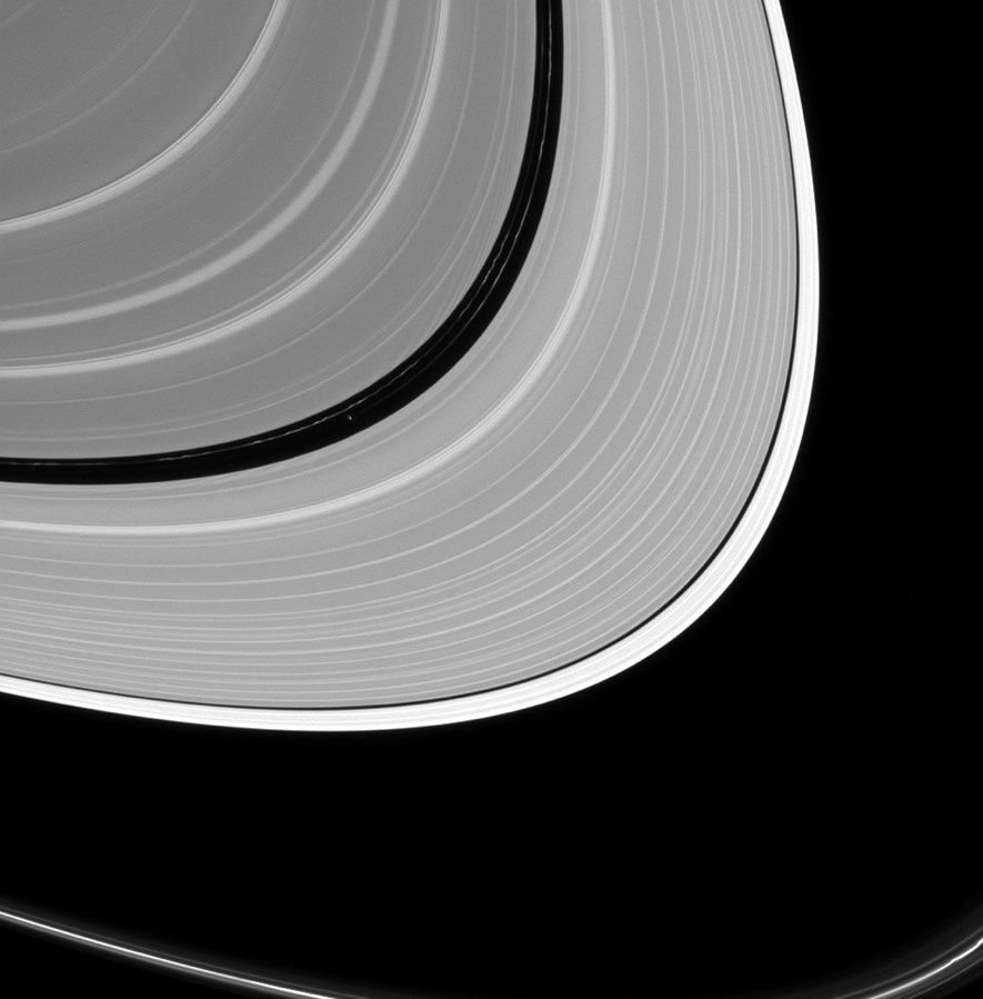 Saturn&#039;s rings part ways for the planet&#039;s moon Pan in this image taken July 2, 2016 by the Cassini spacecraft. 