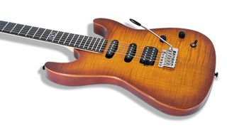 The classic S-type body is fashioned from two slabs of solid mahogany, topped with a figured maple veneer