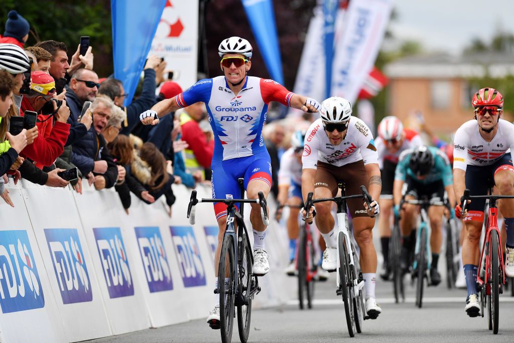 ISBERGUES FRANCE SEPTEMBER 18 Arnaud Demare of France and Team Groupama FDJ celebrates winning ahead of Marc Sarreau of France and Ag2R Citroen Team and Edward Theuns of Belgium and Team Trek Segafredo during the 76th Grand Prix dIsbergues Pas de Calais 2022 a 1976km one day race from Isbergues to Isbergues GPIsbergues on September 18 2022 in Isbergues France Photo by Luc ClaessenGetty Images