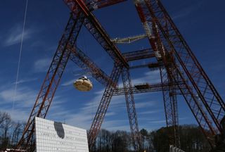 The CST-100 mock up was lifted high into the gantry at Langley to test the water landing characteristics of the design.