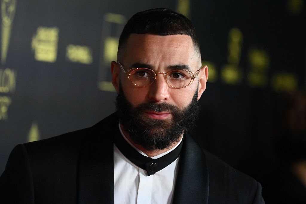 Real Madrid star Karim Benzema wins the Ballon d&#039;Or 2022: Real Madrid&#039;s French forward Karim Benzema poses upon arrival to attend the 2022 Ballon d&#039;Or France Football award ceremony at the Theatre du Chatelet in Paris on October 17, 2022.