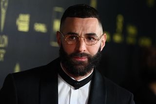 Real Madrid's French forward Karim Benzema poses upon arrival to attend the 2022 Ballon d'Or France Football award ceremony at the Theatre du Chatelet in Paris on October 17, 2022.