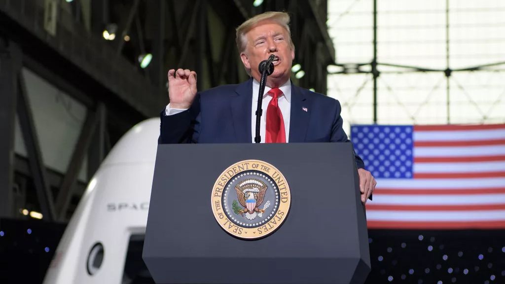 President Donald Trump speaks inside the Vehicle Assembly Building following the launch of a SpaceX Falcon 9 rocket carrying the company&#039;s Crew Dragon spacecraft on NASA’s SpaceX Demo-2 mission with NASA astronauts Robert Behnken and Douglas Hurley onboard, Saturday, May 30, 2020, at NASA’s Kennedy Space Center in Florida.