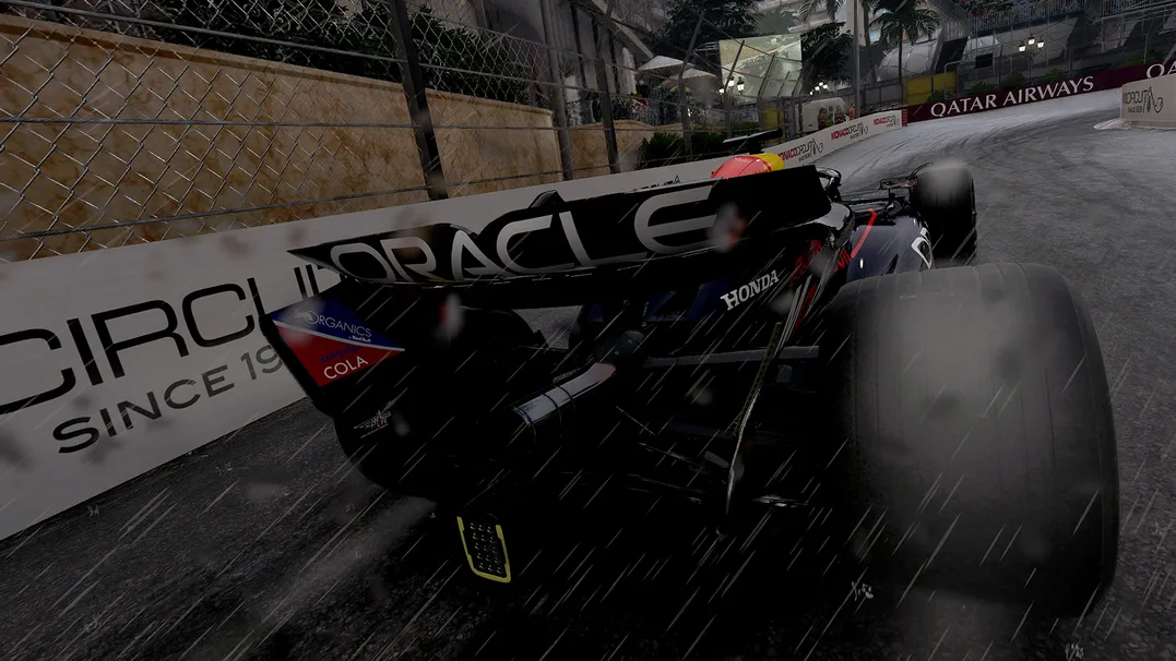 A player driving through the rain in F1 24 on PS5 Pro.