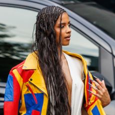 Tyla wears a colorful jacket