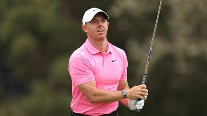 Rory McIlroy looks on after playing an iron shot at the 2023 US Open