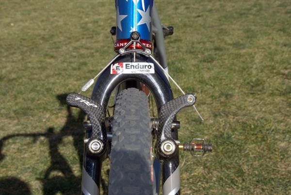 The relatively low profile of the TRP CR950 brakes goes against the current wide profile trend, but still provide plenty of stopping power and are less likely to clip her legs as she leaps over the barriers.