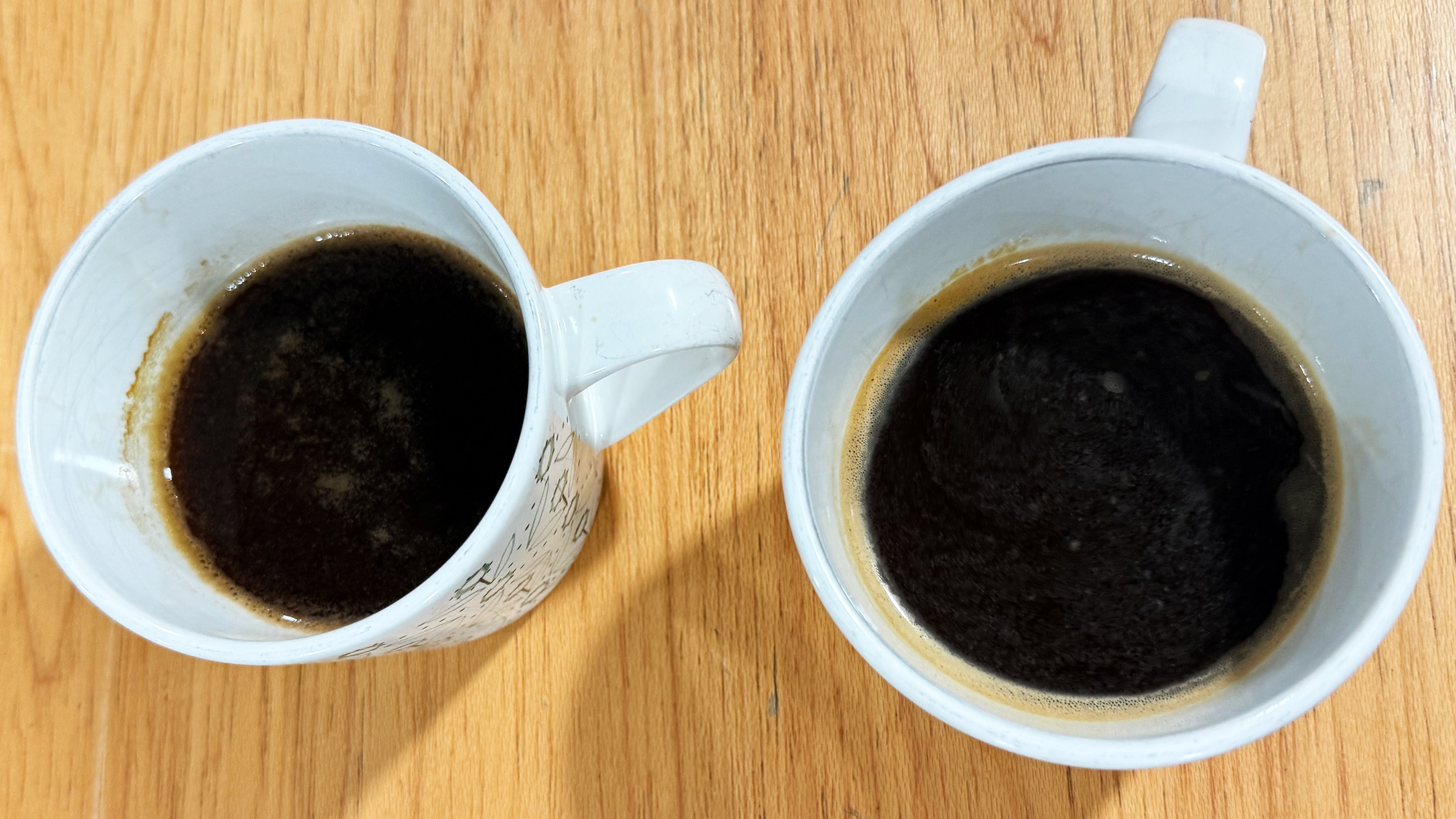 two americanos, both made on the breville bambino, one with coffee ground on the mazzer philos, one with coffee ground on the baratza encore esp pro