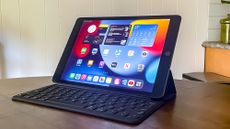 best tablet under $500 top pick: the iPad 2021, sitting open on a desk with a keyboard case