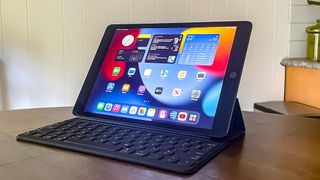 best tablet under $500 top pick: the iPad 2021, sitting open on a desk with a keyboard case