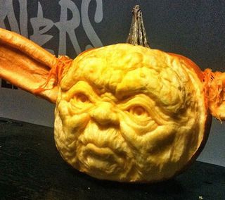 Yoda pumpkin may not be scary but it's awesome! Image © Maniac Pumpkin Carvers LLC 2012