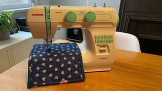 sewing machine review Janome 2200XT: a photo of a sewing machine on a kitchen table