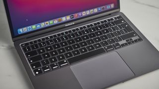 Apple MacBook Air (M1,2020) on a gray surface