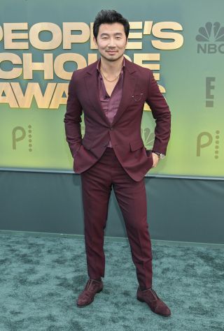 Simu Liu at the People's Choice Awards held at Barker Hangar on February 18, 2024 in Santa Monica, California.