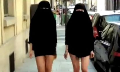 Two young Parisians flaunt bare legs and Islamic veils in a stand against the recent burqa ban.