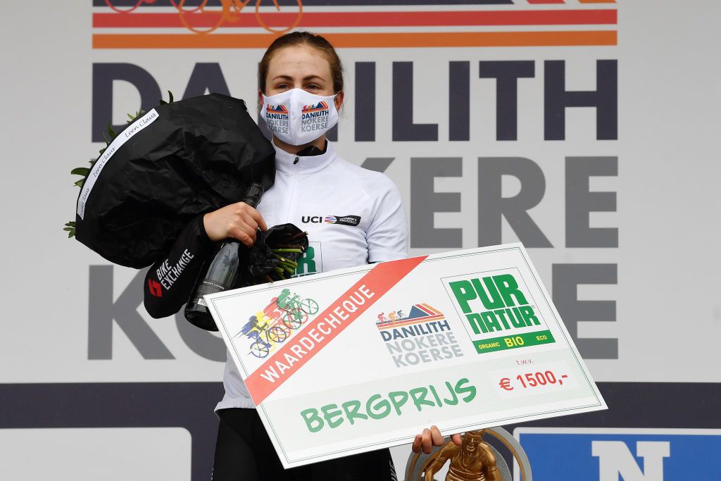 NOKERE BELGIUM MARCH 17 Podium Grace Brown of Australia and Team BikeExchange White best young jersey Celebration during the 3rd Nokere Koerse Danilith Classic 2021 Womens Elite a 124km race from Deinze to Nokere Mask Covid safety measures Champagne Flowers Trophy NokereKoerse on March 17 2021 in Nokere Belgium Photo by Mark Van HeckeGetty Images