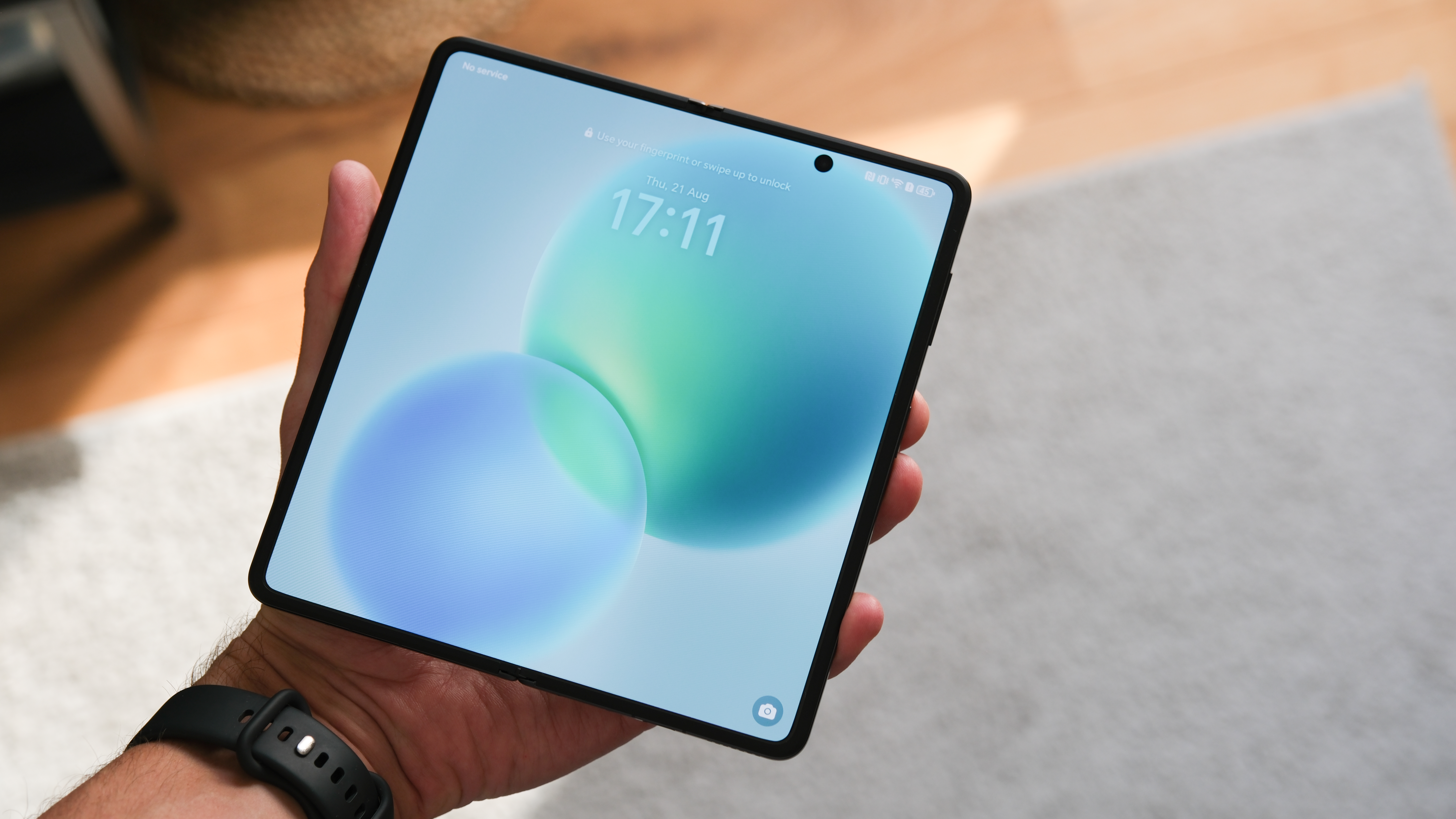Interior screen of the Honor Magic V5 folding phone held in a hand