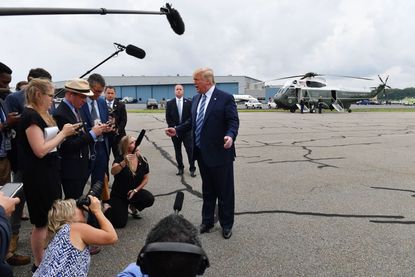 Trump meets the press aboard Air Force One
