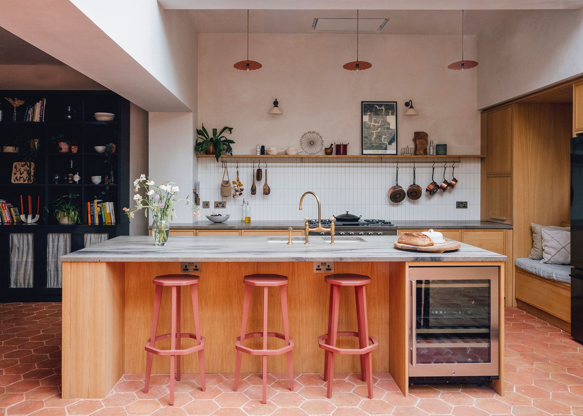kitchen extension with large kitchen island with wine cooler and marble work surface