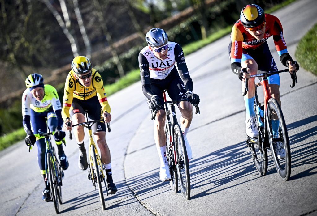LtoR Dutch Taco van der Hoorn of IntermarcheCircusWanty Belgian Tiesj Benoot of JumboVisma Belgian Tim Wellens of UAE Team Emirates and Slovenian Matej Mohoric of Bahrain Victorious ride in the KuurneBrusselsKuurne one day cycling race 193kms from Kuurne to Kuurne via Brussels on February 26 2023 Photo by JASPER JACOBS Belga AFP Belgium OUT Photo by JASPER JACOBSBelgaAFP via Getty Images