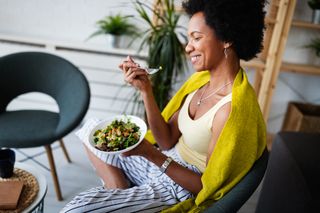 Gut health hacks: Woman eating lunch at home