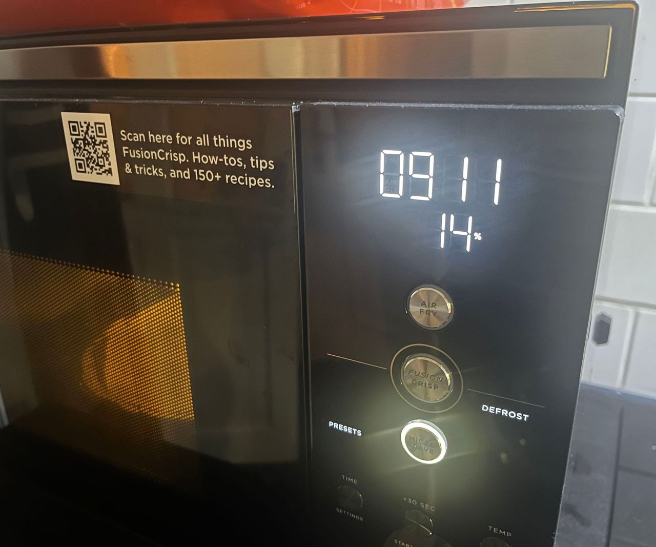 A microwave LED screen at 14% power