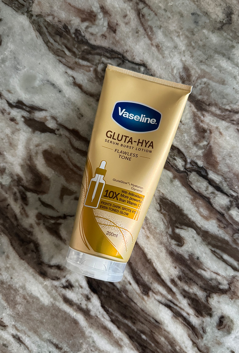 Vaseline body lotion on a marble table